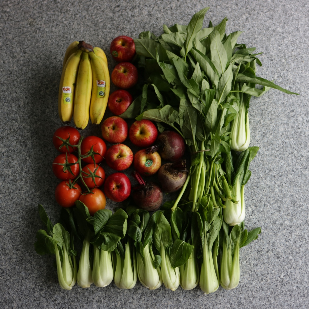 An arrangement of fresh produce featuring lots of bok choi.